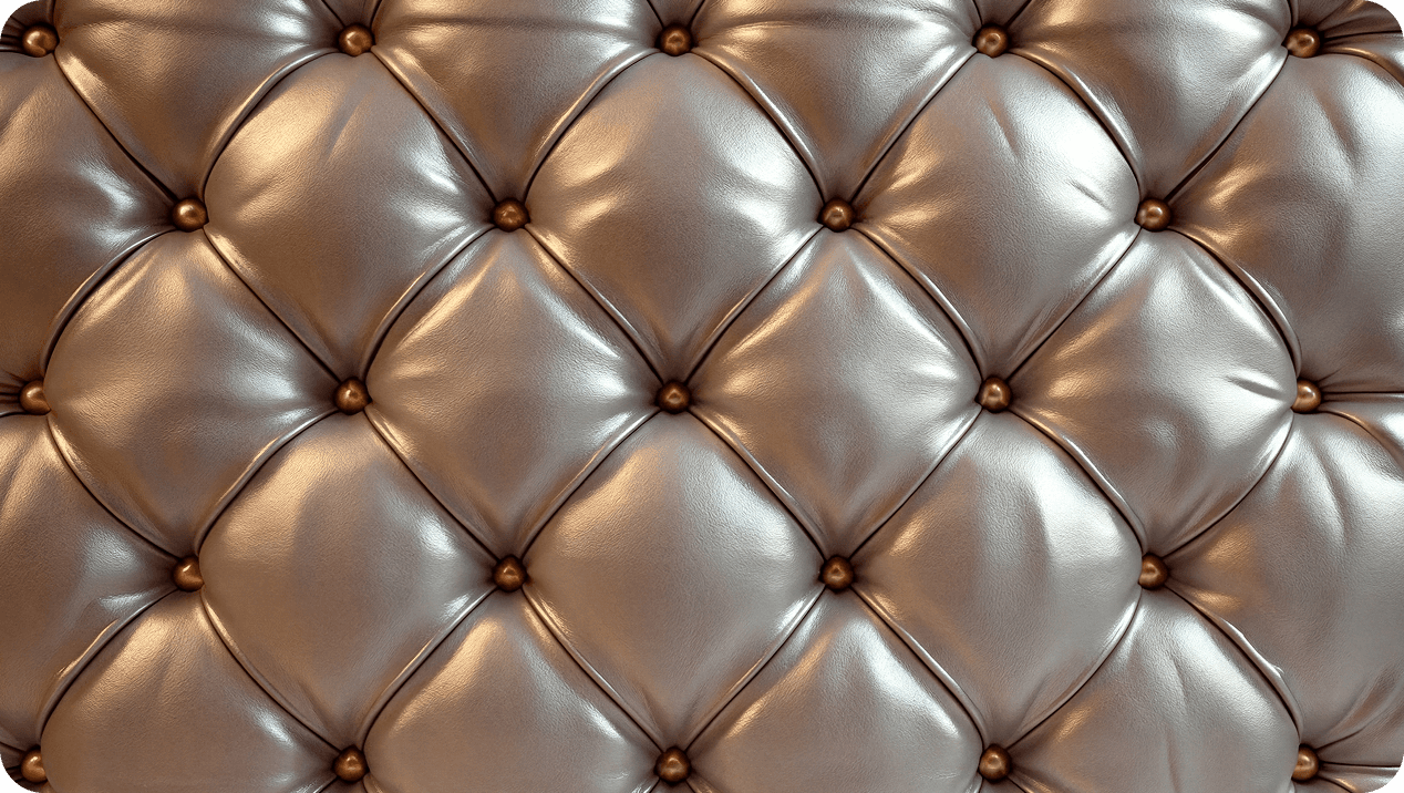 Silver quilted upholstery leather with brass studs
