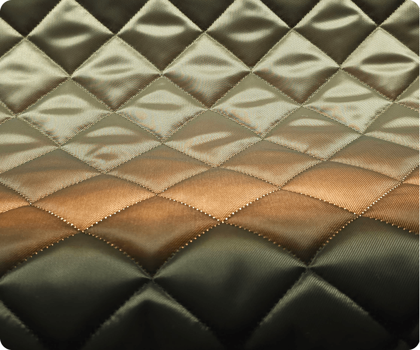 Close-up of olive and bronze diamond-quilted shell fabric