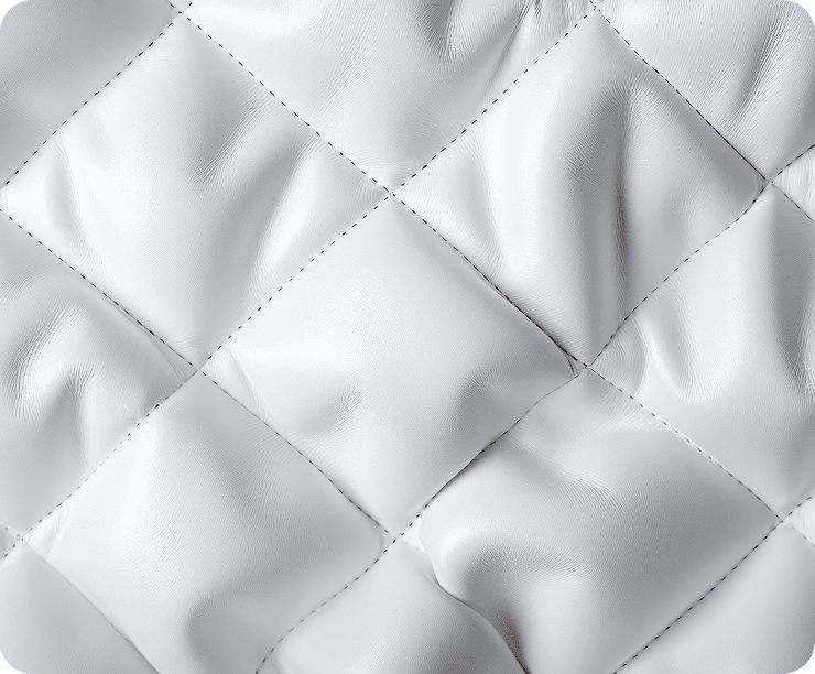 Close-up of white diamond-quilted polyester panel