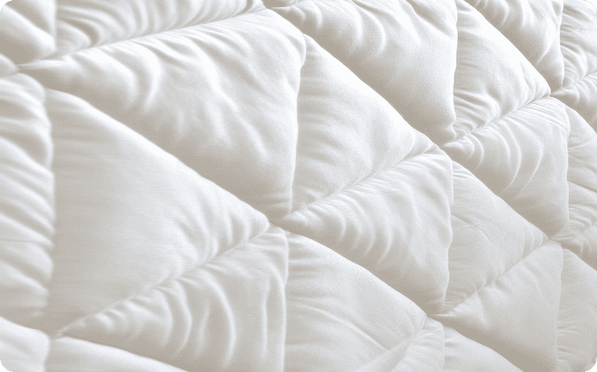 White quilted mattress protector